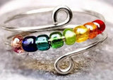 Spinning bead fidget ring