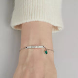 Engraved bar and birthstone bangle.