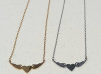 Winged heart necklace