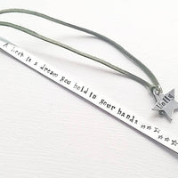 Stamped metal bookmark