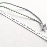 Stamped metal bookmark