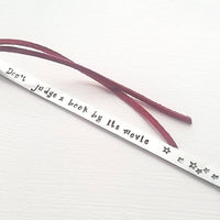 Stamped metal bookmark